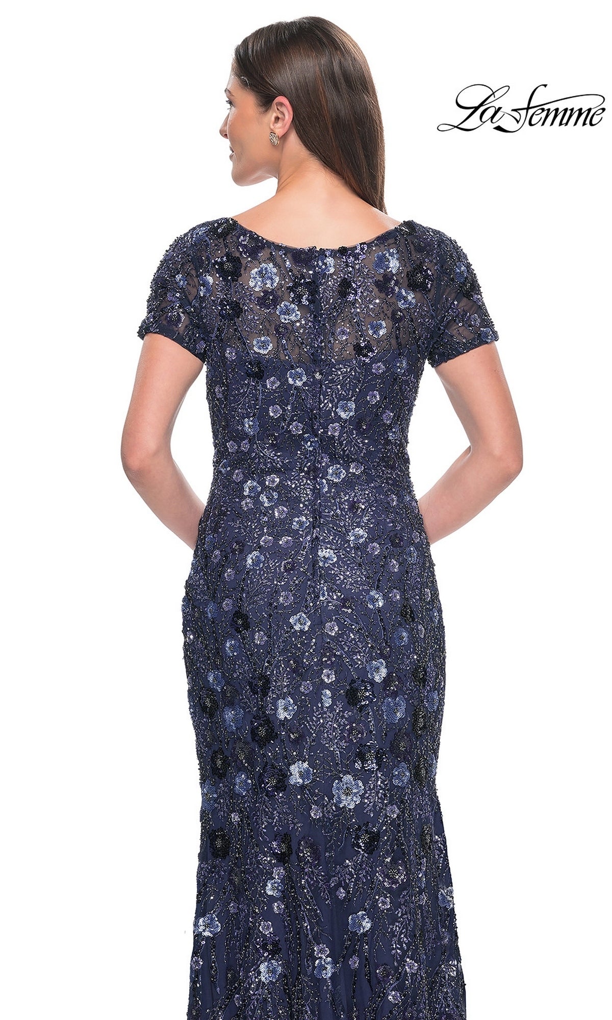 Back view of the Long Formal Dress: La Femme 31779, a floor-length navy gown featuring short sleeves and intricate floral beadwork and sequins.